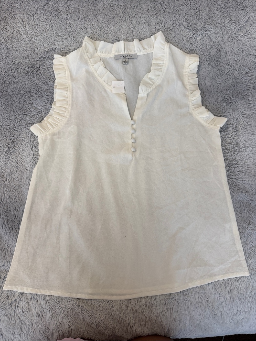 CeCe Ivory Sleeveless Ruffle-Trim Button Front Top